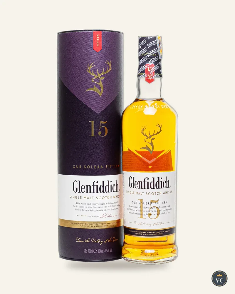 Chai Glenfiddich 15 năm cạnh hộp ống tím